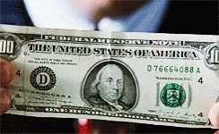Gif showing Leonardo Dicaprio in the Wolf of Wallstreet movie throwing a hundred dollar bill into a trash can full of crumpled money.